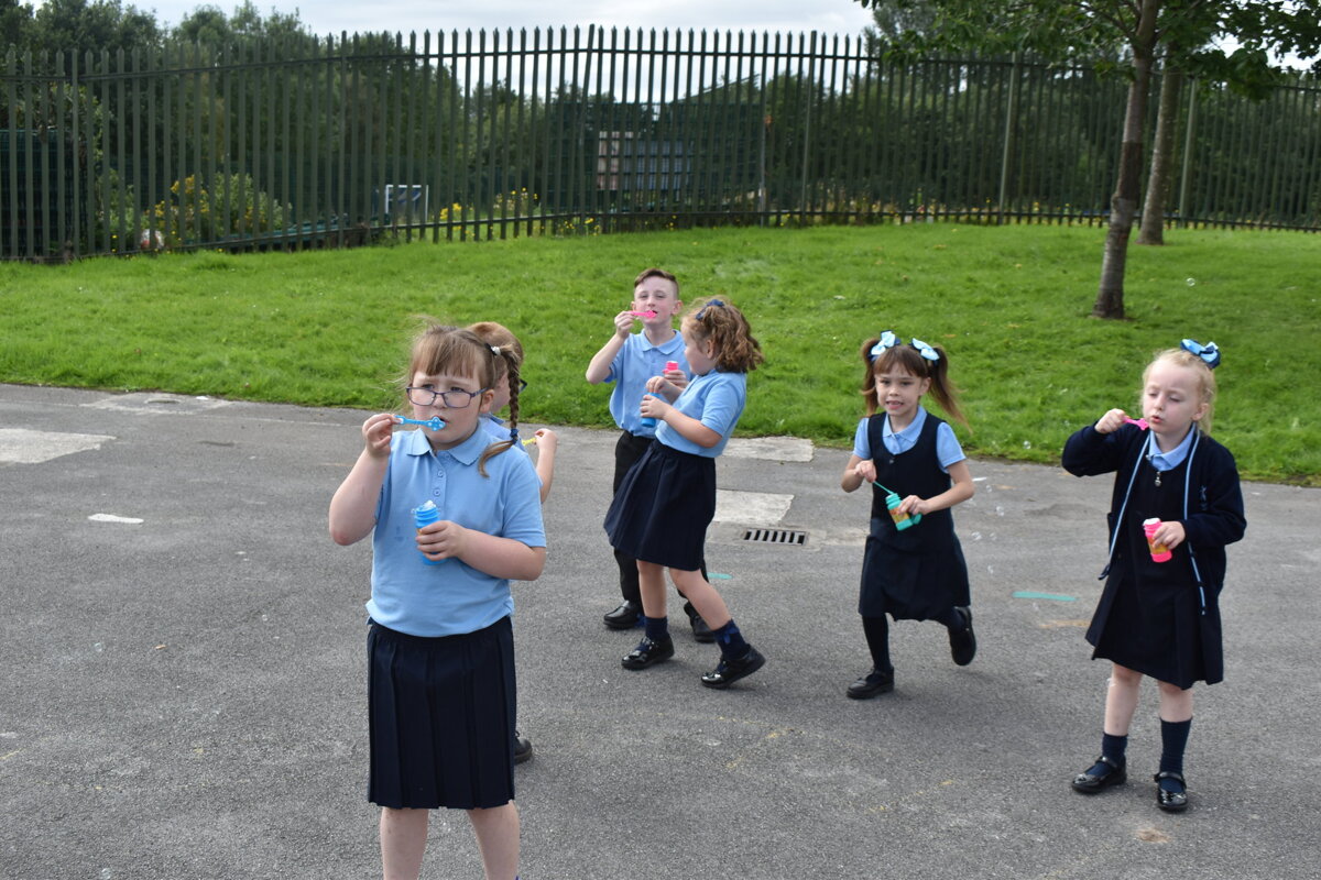 Image of Year 2 bubble enjoying their bubbles
