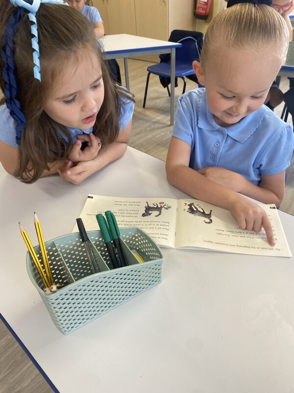 Image of Year 2 - Reading with friends!