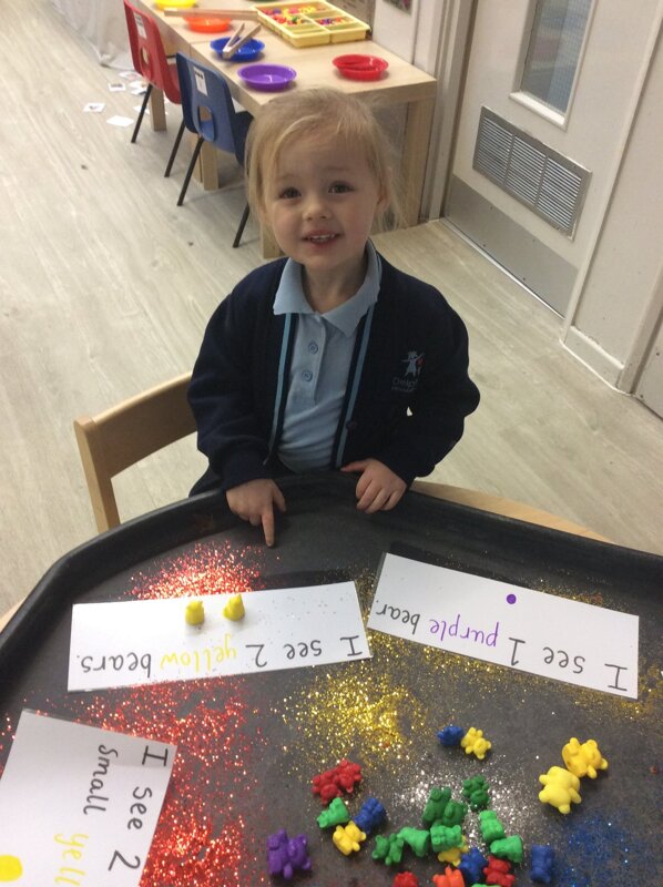 Image of Pre school-- exploring 2D shapes and categorising objects by colour